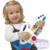 Игрушка музыкальная Гитара 2 в 1 Chicco Baby Guitar 2014 девочка играет	